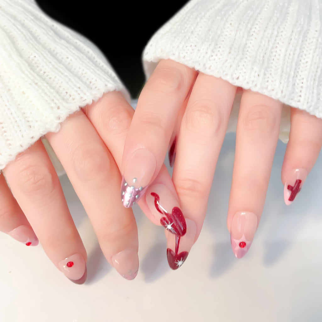 medium length red almond press on nails with crusader design