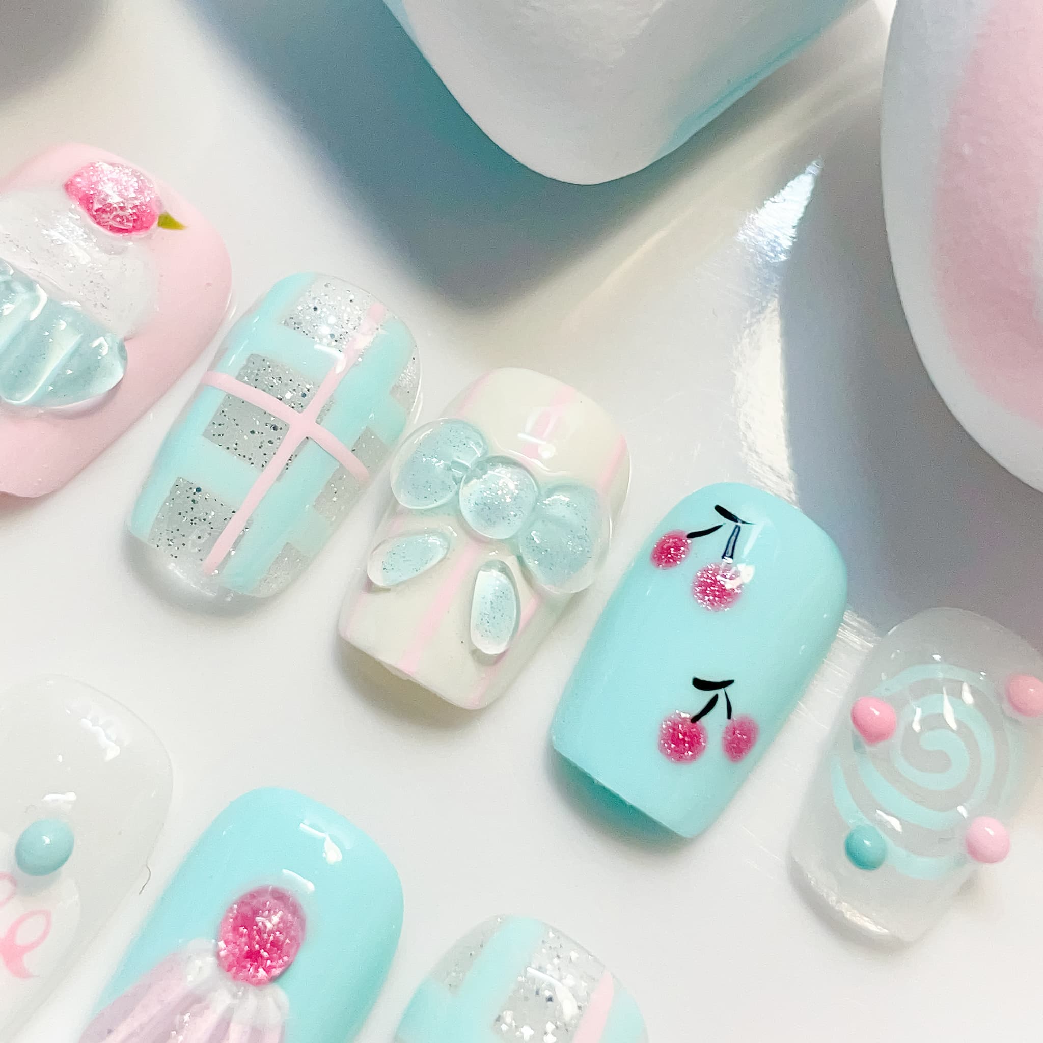 short length light blue coffin press on nails with cupcake and cherry design