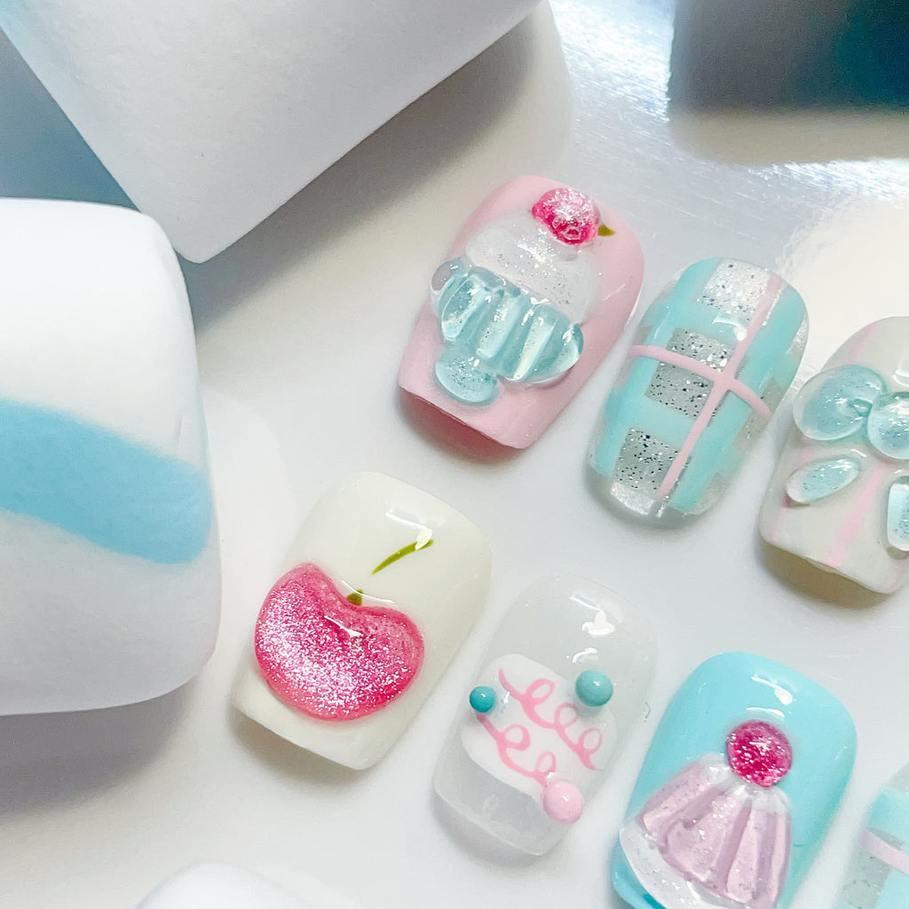 short length light blue coffin press on nails with cupcake and cherry design