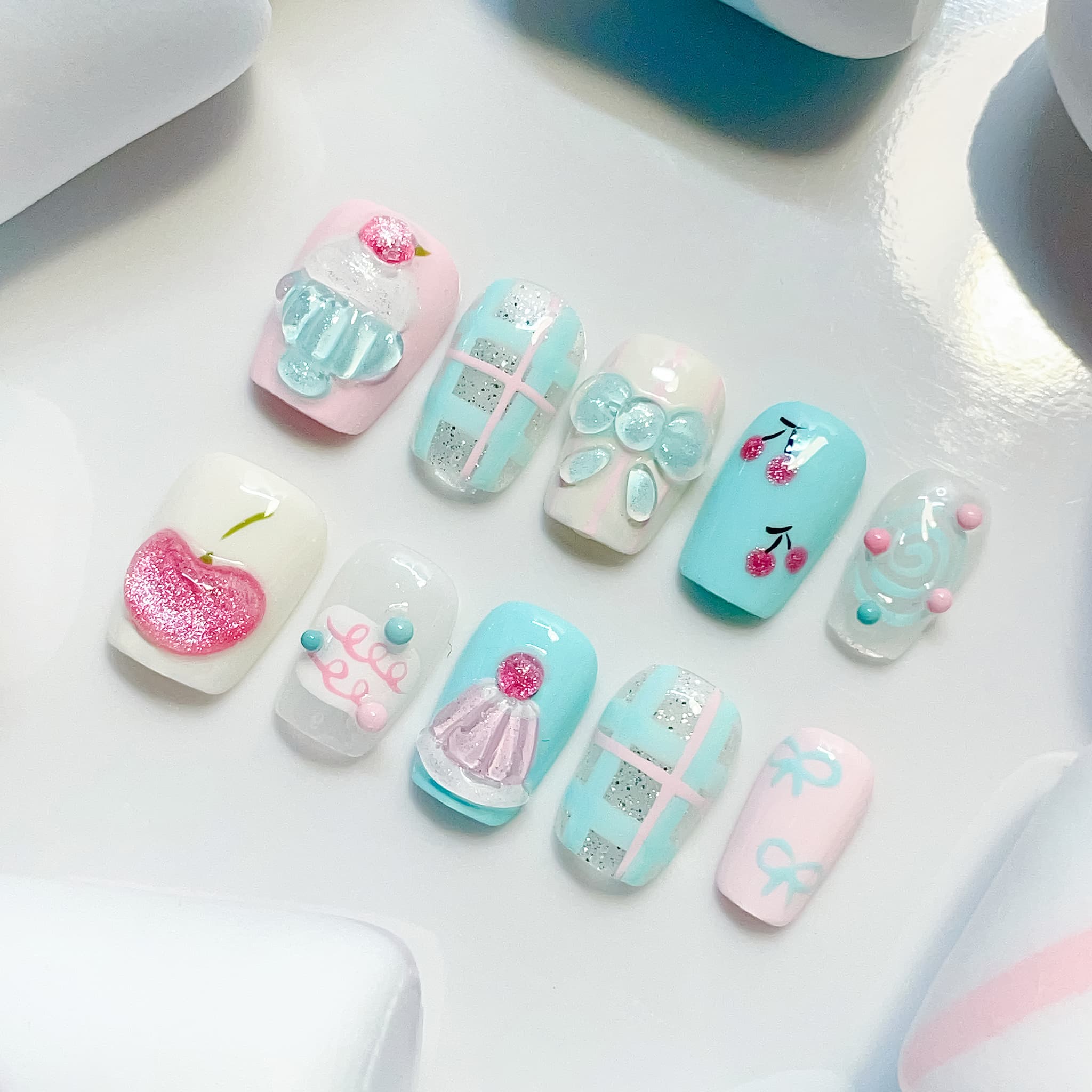 short length light blue coffin press on nails with cupcake and cherry design