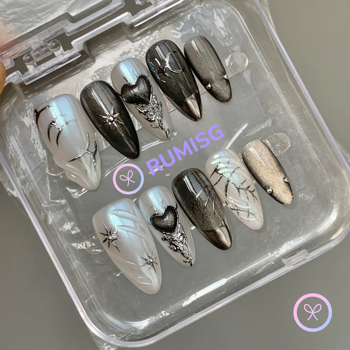 goth black chrome medium almond press on nails with star