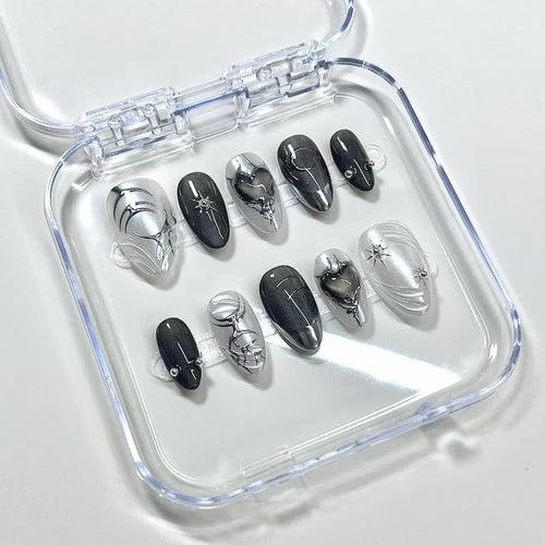 gothic black chrome short almond press on nails with swirls and black hearts