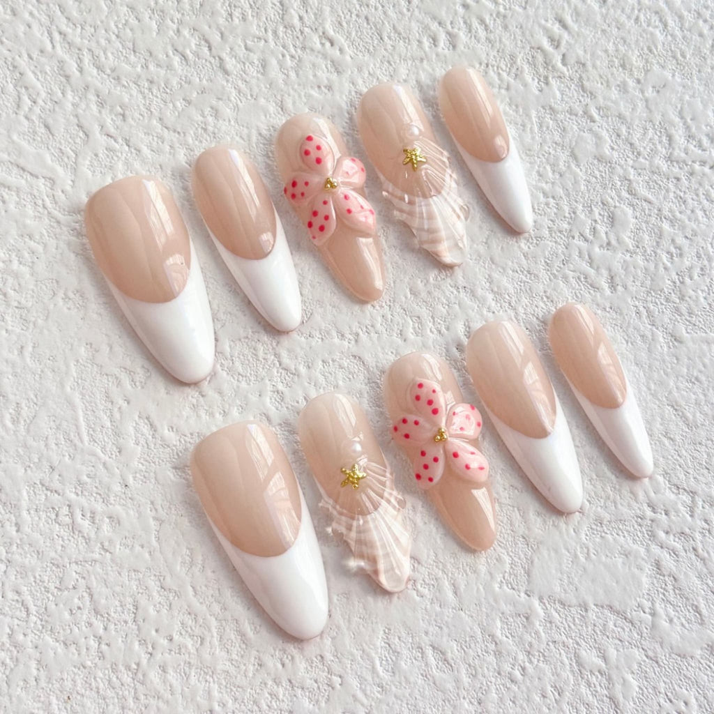 medium length peach puff almond press on nails with floral design