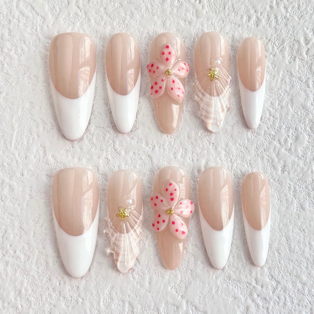 medium length peach puff almond press on nails with floral design