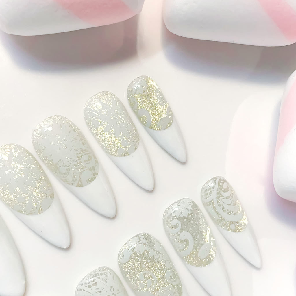 medium length white stiletto press on nails with lace design