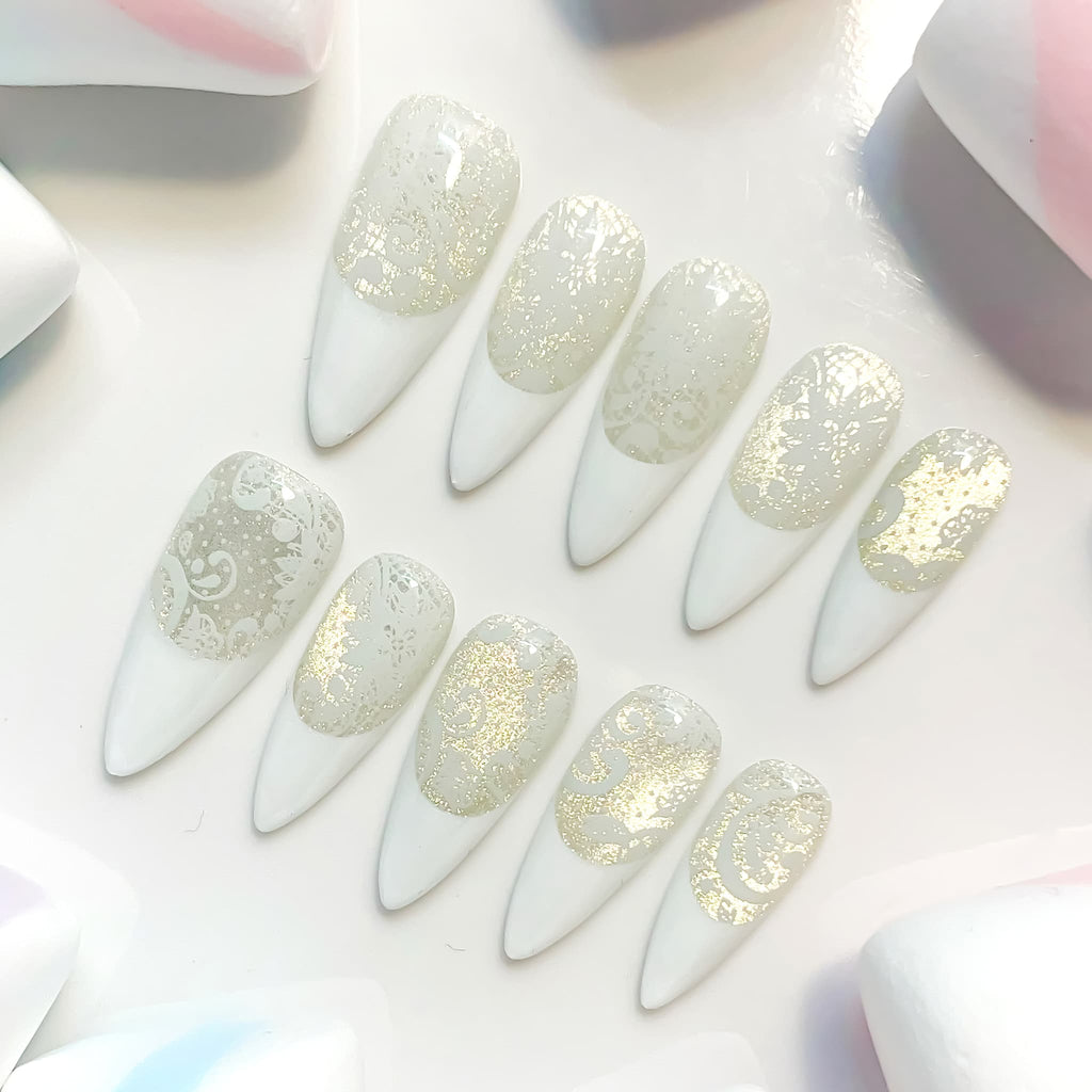 medium length white stiletto press on nails with lace design