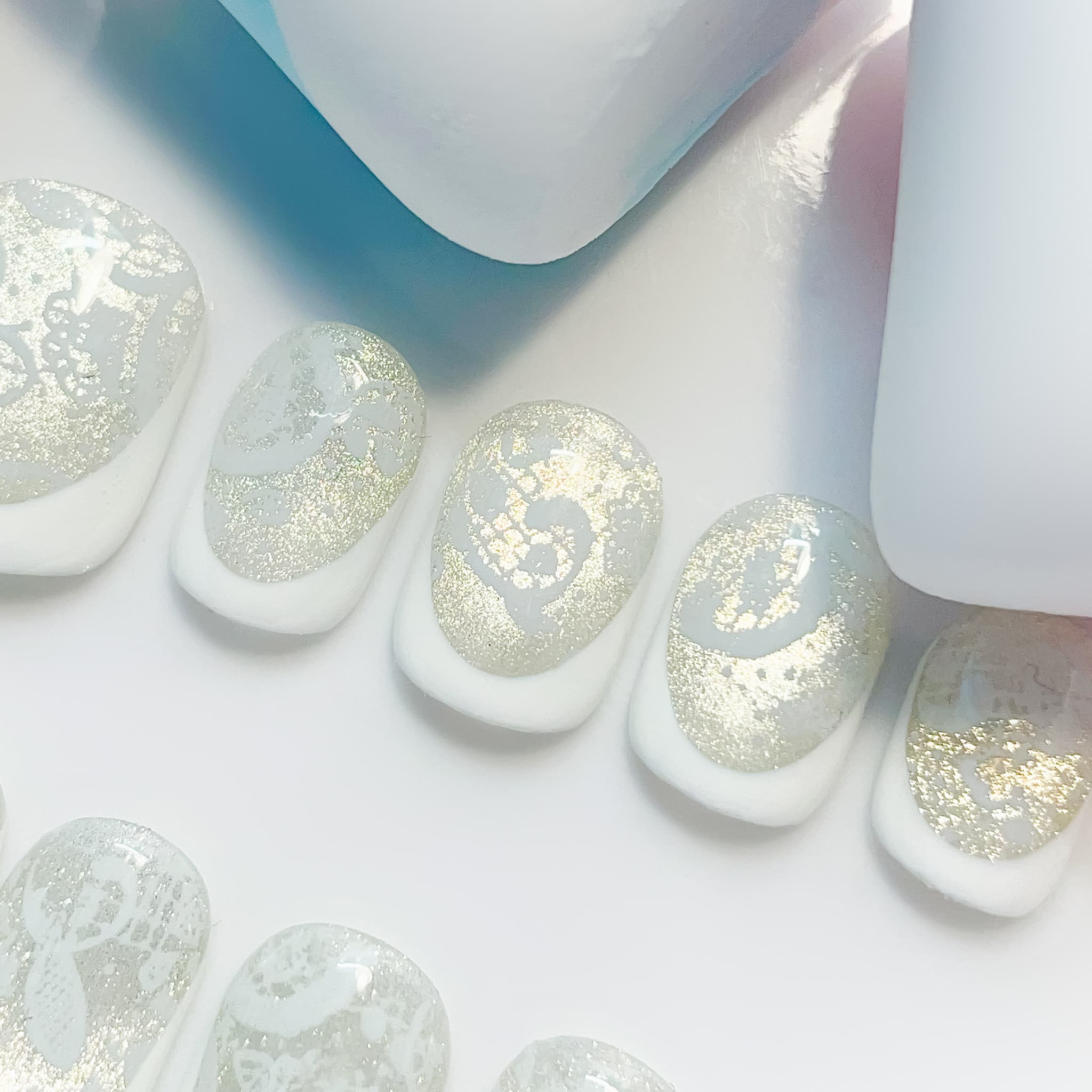 short length white squoval press on nails with lace design