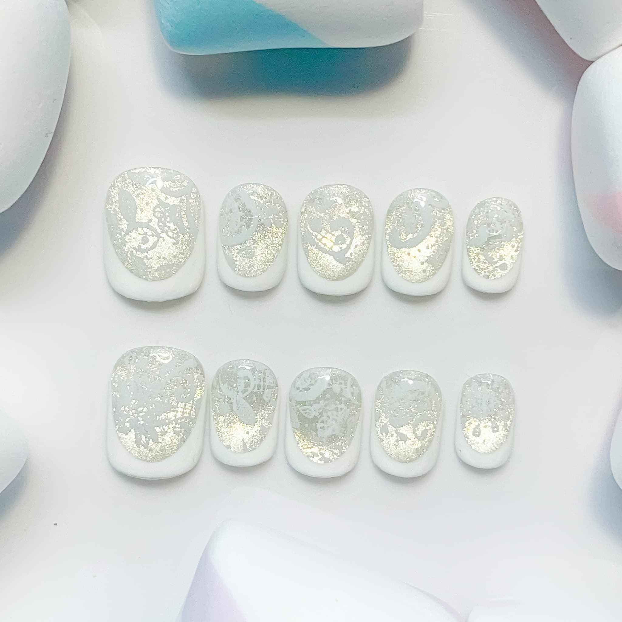 short length white squoval press on nails with lace design