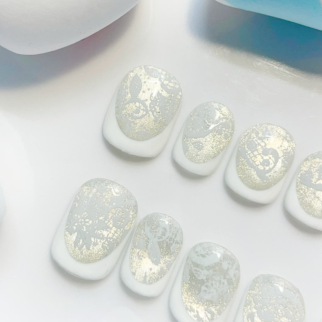 short length white squoval press on nails with lace design