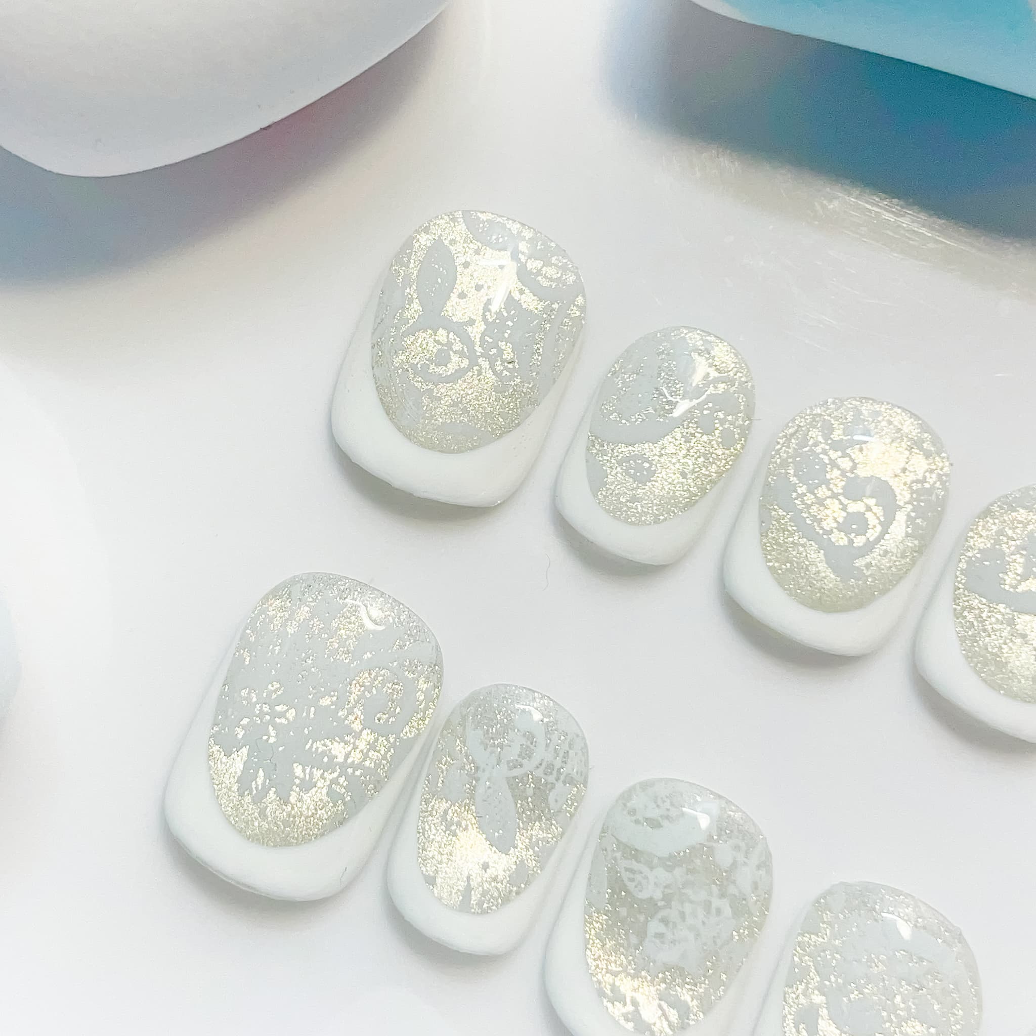 short length white squoval press on nails with lace design
