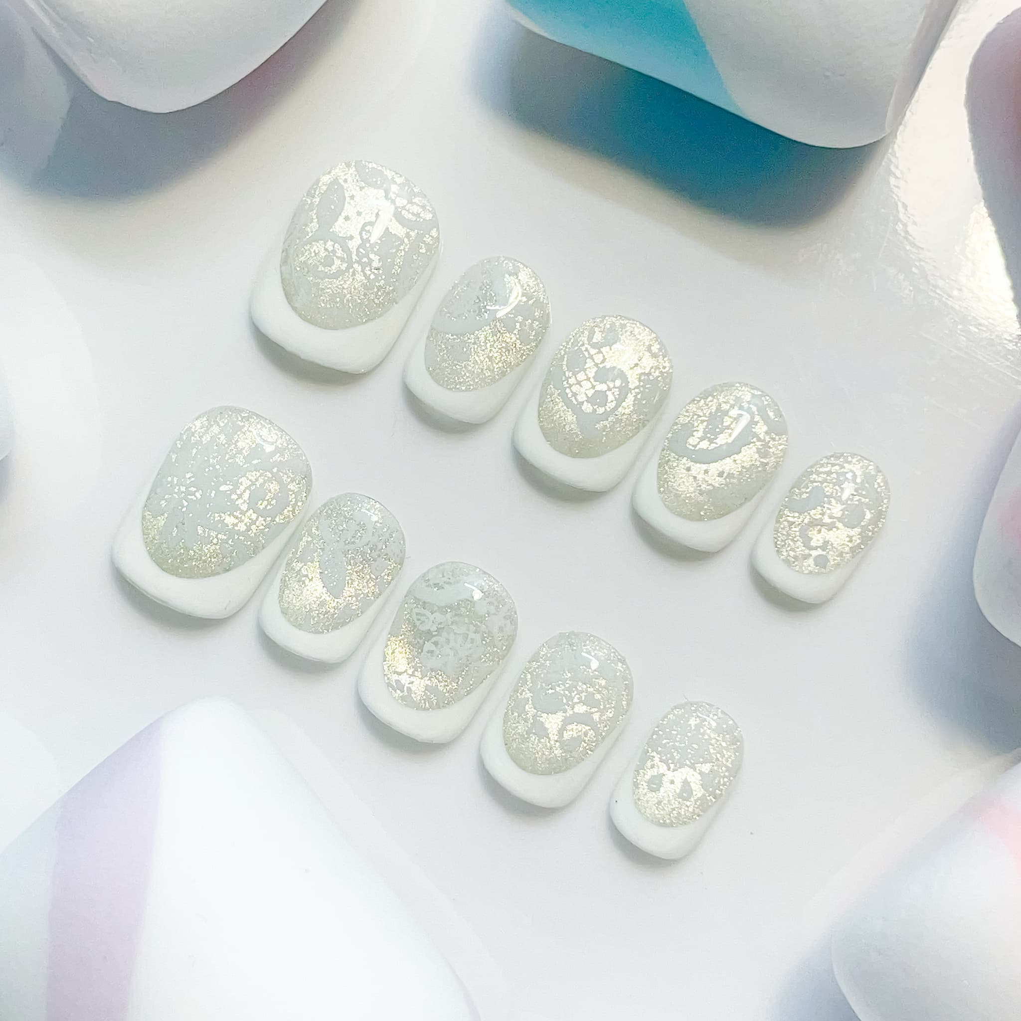 short length white squoval press on nails with lace design