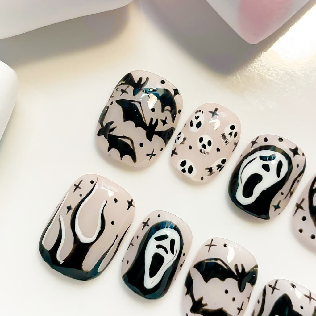 short length black squoval press on nails with halloween and cat design