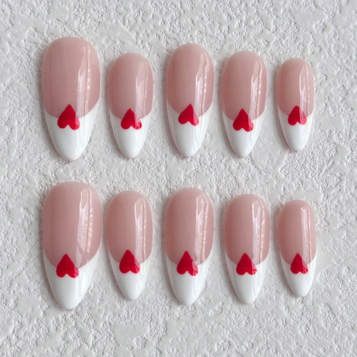 medium white almond press on nails with heart shapes, french tips press on nails