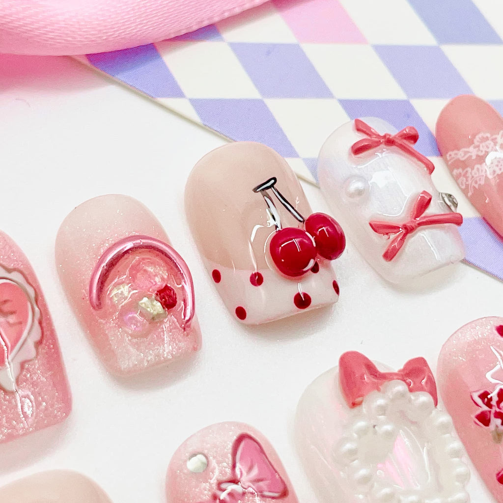 short length pink coffin press on nails with heart shape design