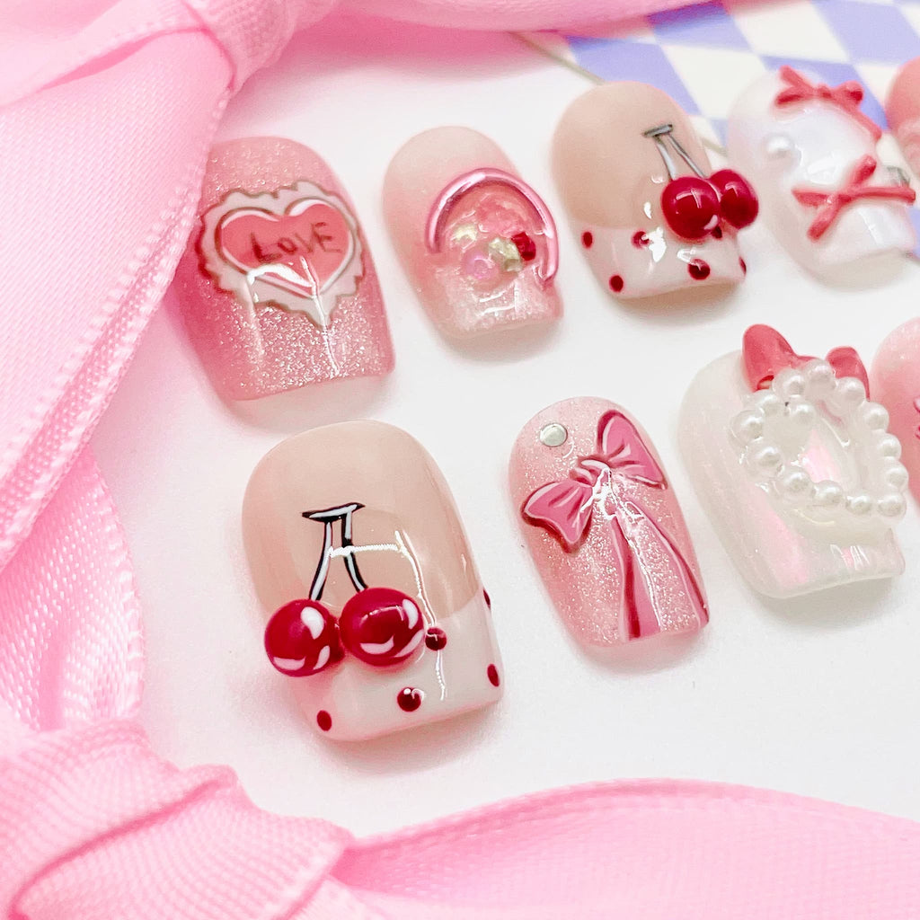 short length pink coffin press on nails with heart shape design