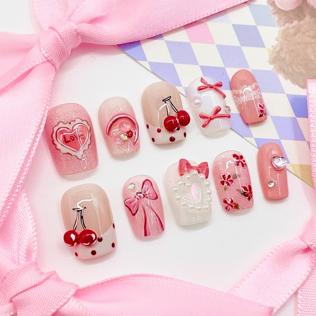short length pink coffin press on nails with heart shape design