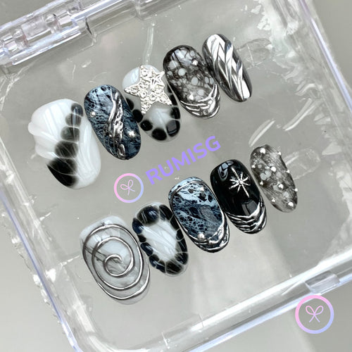 goth black glossy short oval press on nails with bloom scales and chrome swirls