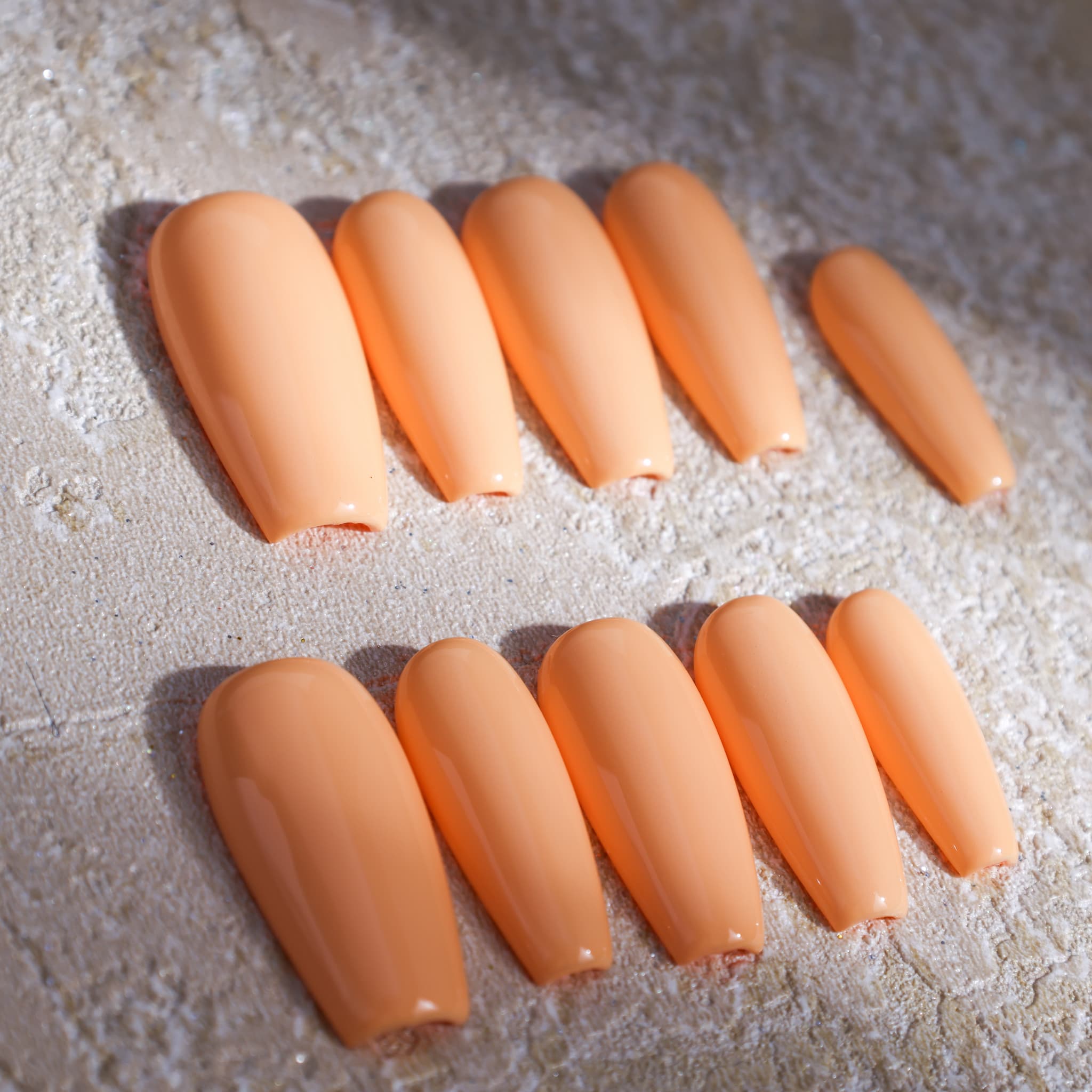 medium length macaron orange coffin press on nails solid colour nails