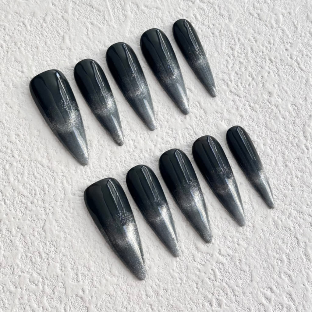 long length black stiletto press on nails with black to silver gradient