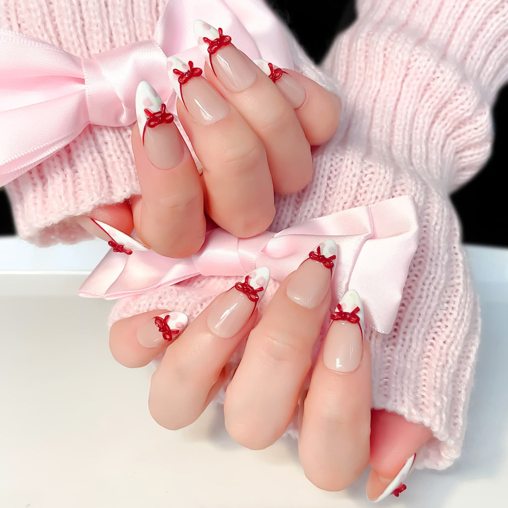 medium length white almond press on nails with cherries and bow design