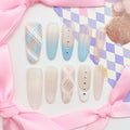 Set of decorative false nails with pastel colors and patterns