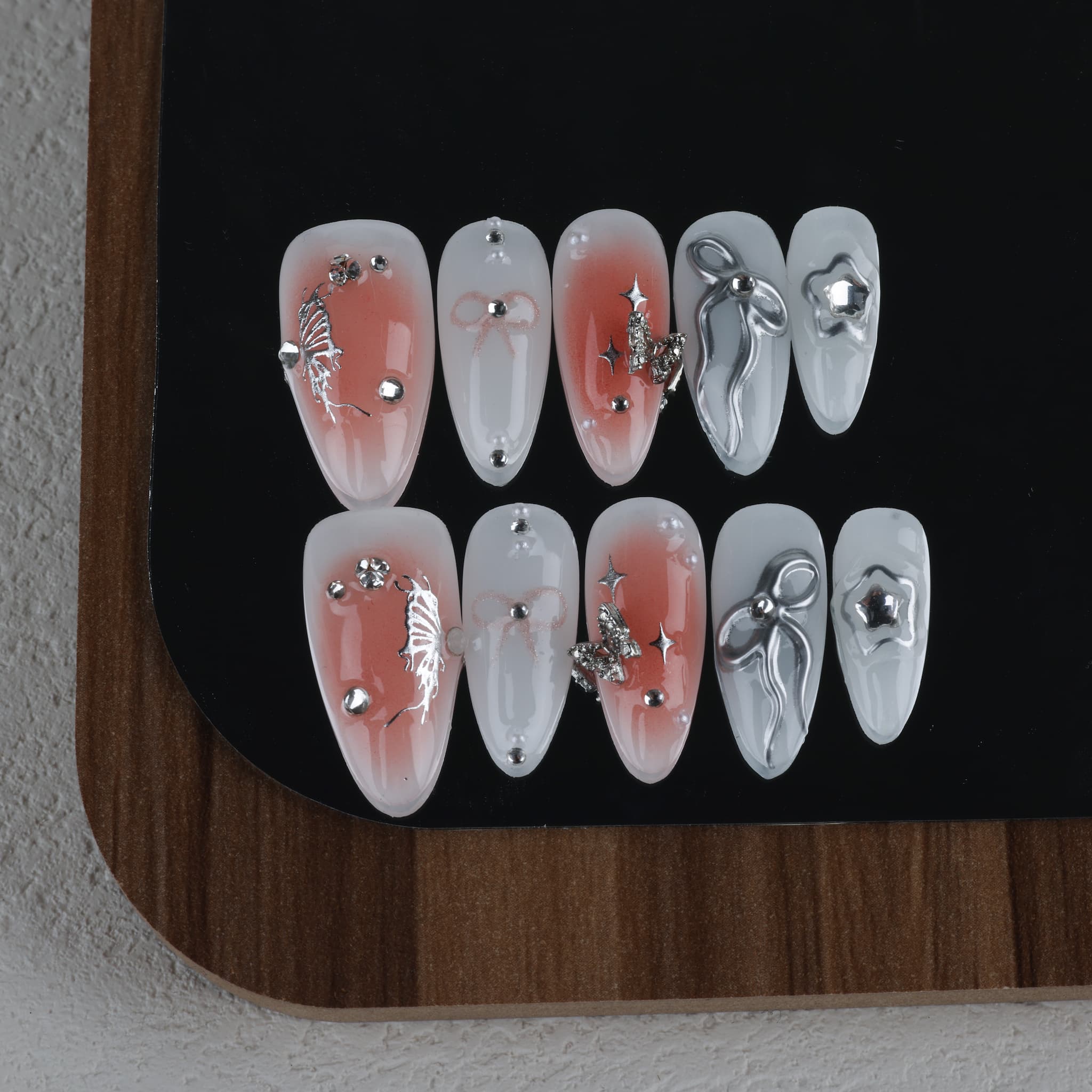 medium length white almond press on nails with stars and butterfly