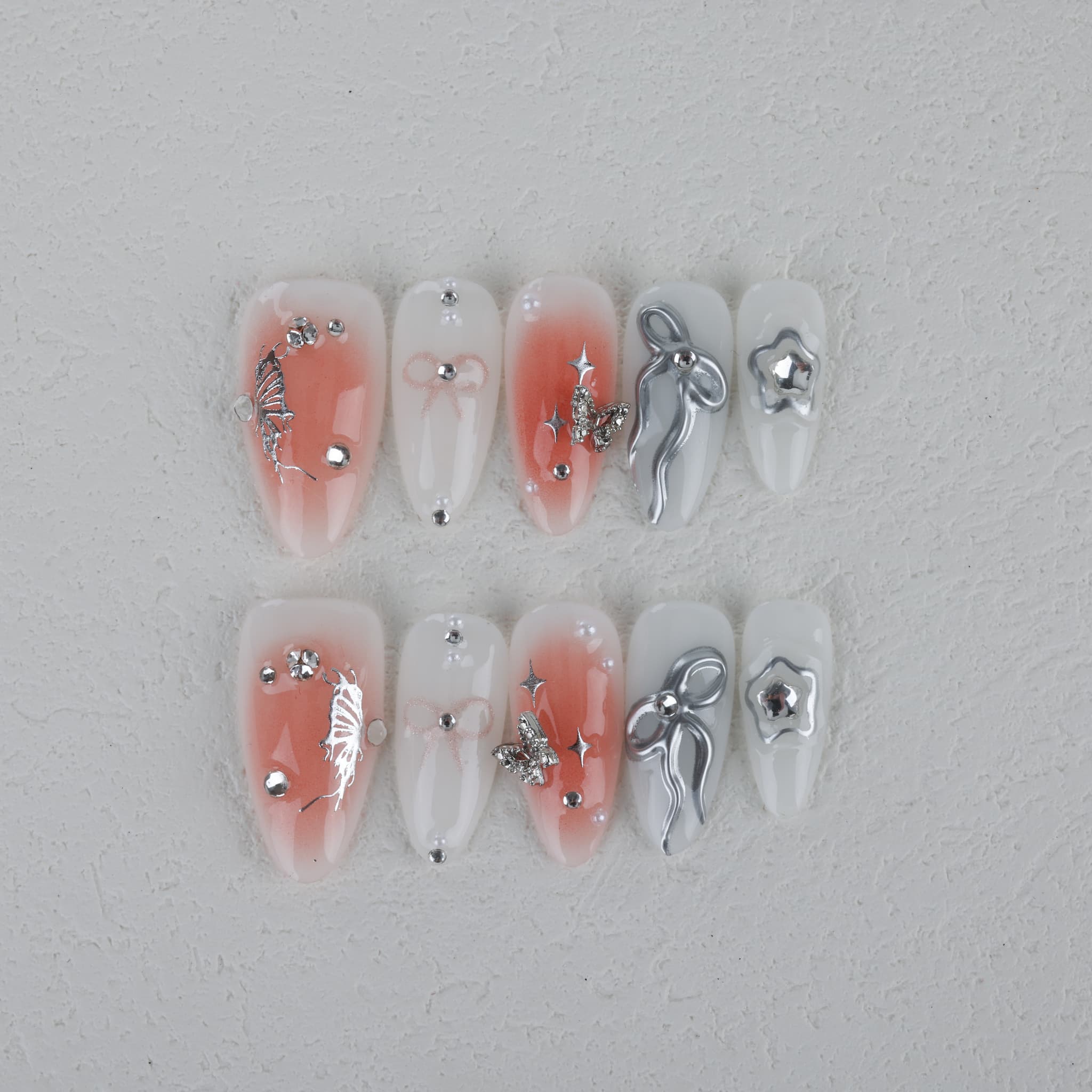medium length white almond press on nails with stars and butterfly