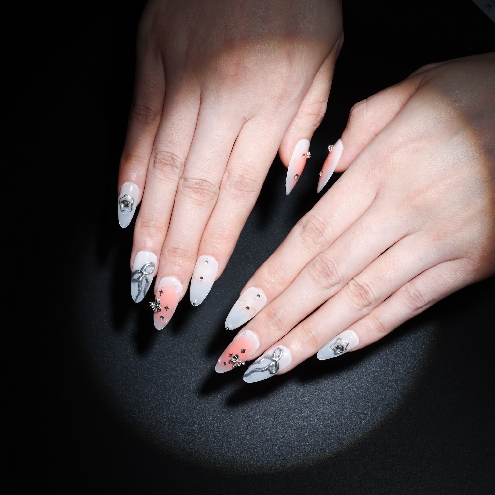 medium length white almond press on nails with stars and butterfly