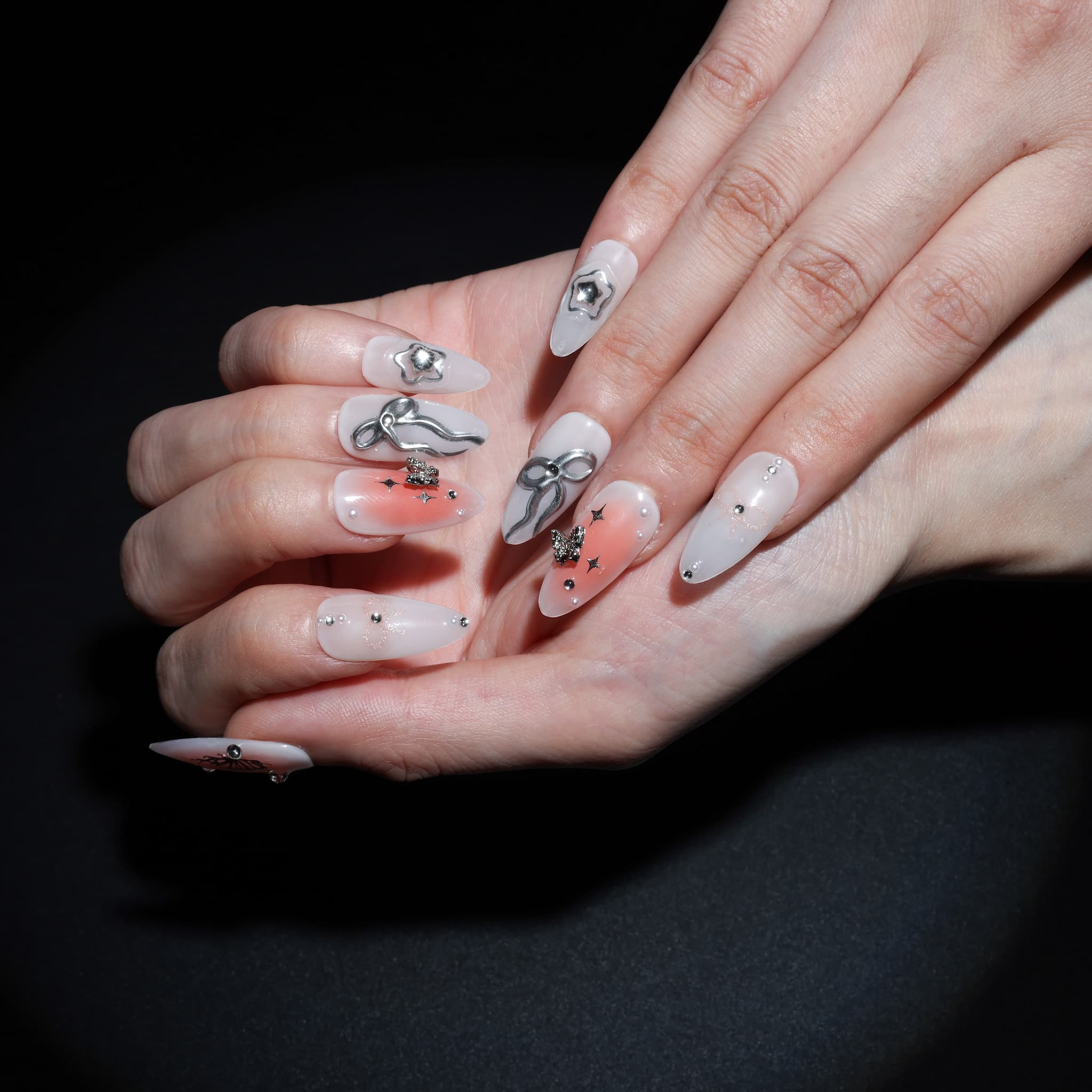 medium length white almond press on nails with stars and butterfly