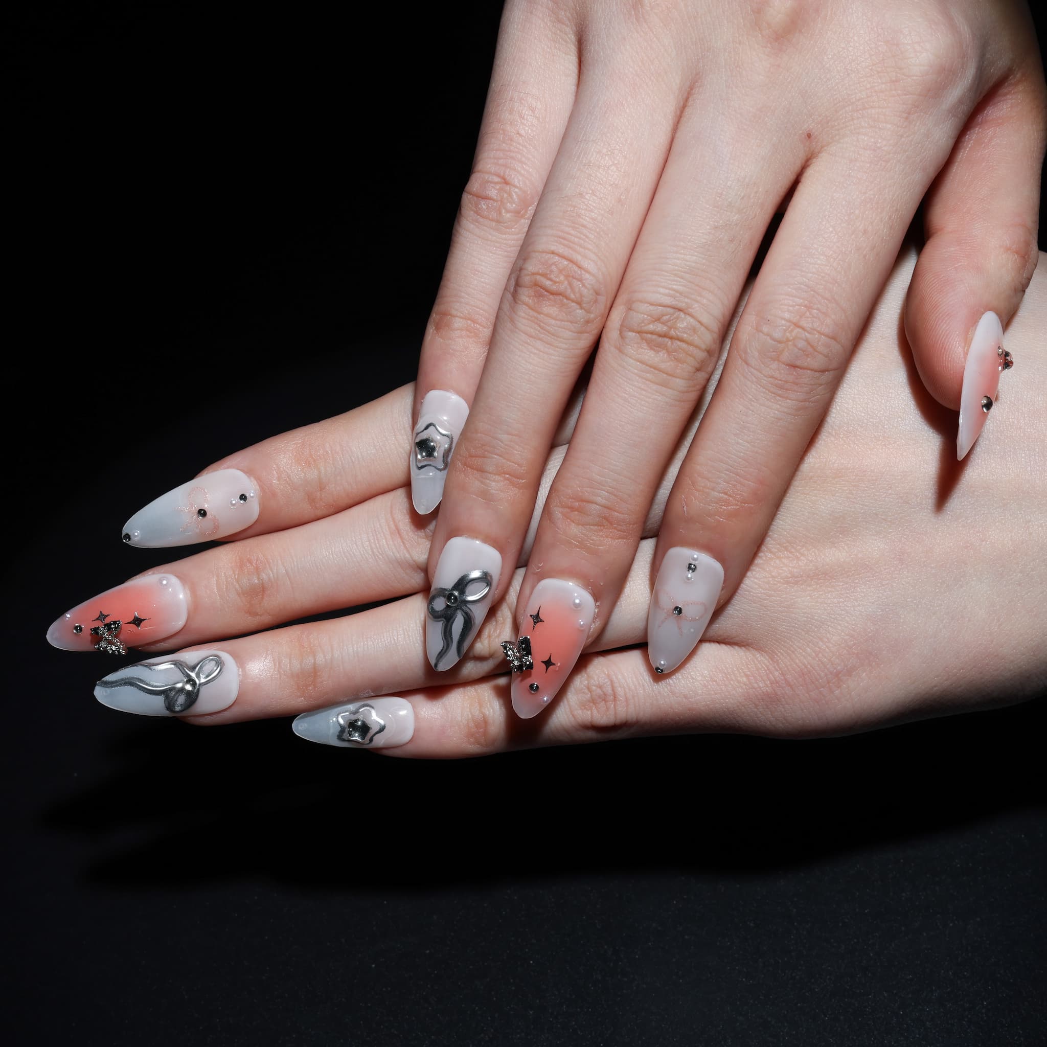 medium length white almond press on nails with stars and butterfly