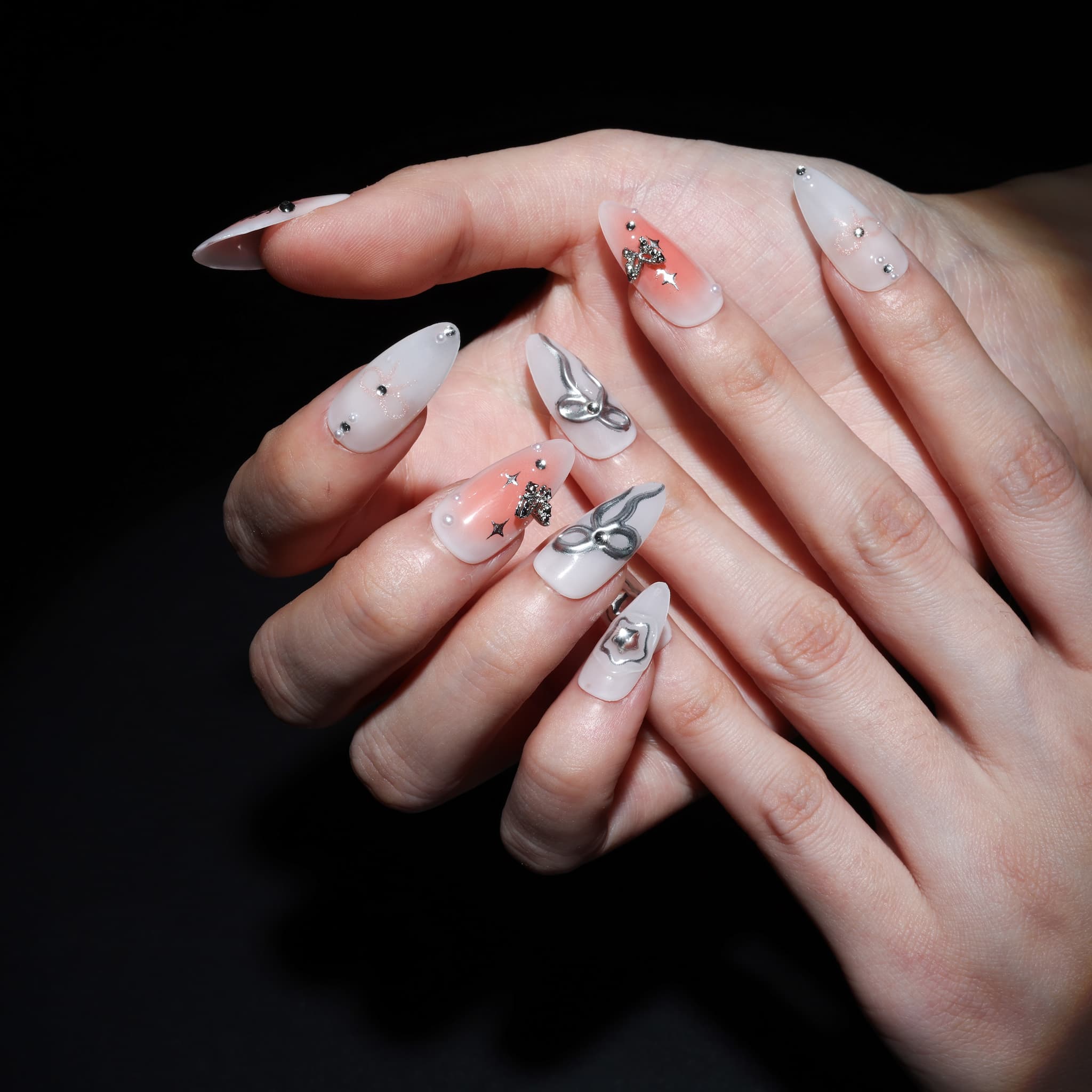 medium length white almond press on nails with stars and butterfly