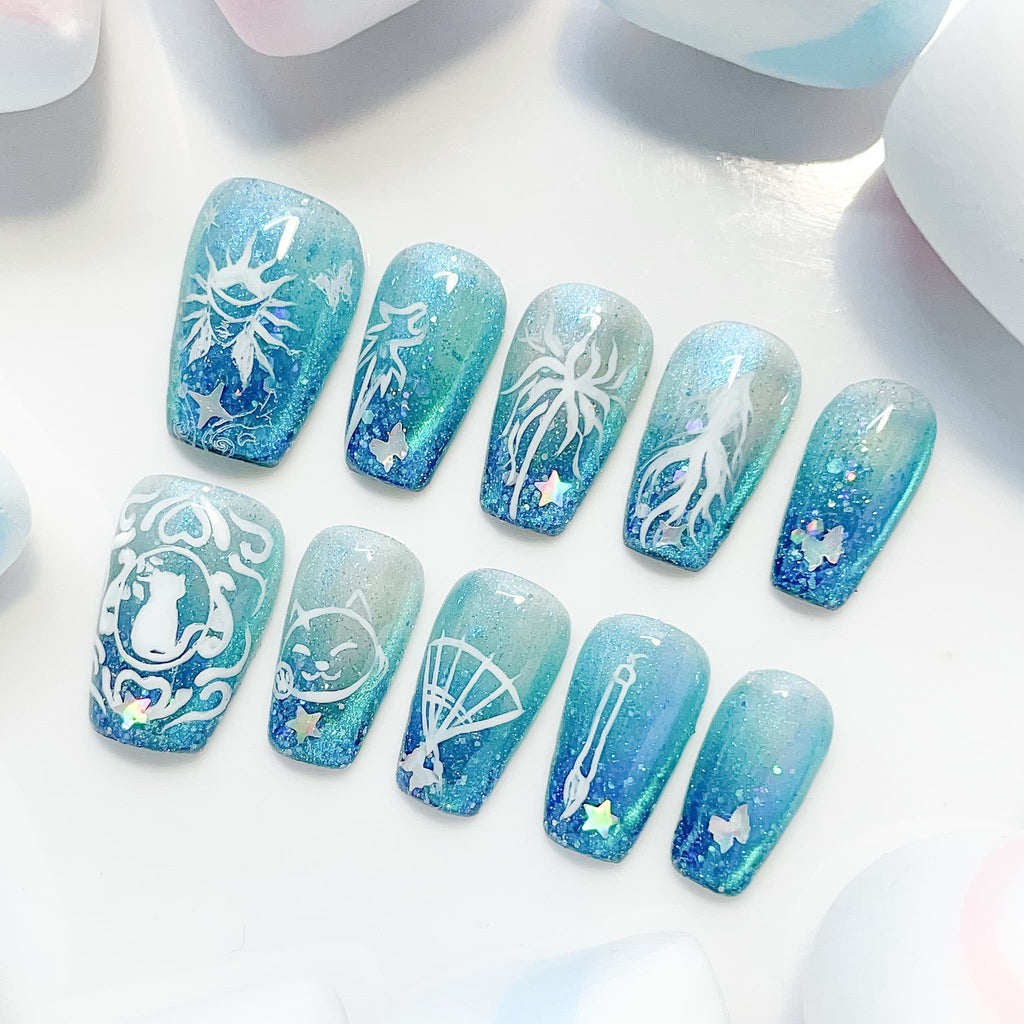 medium length teal coffin press on nails with game inspired designs