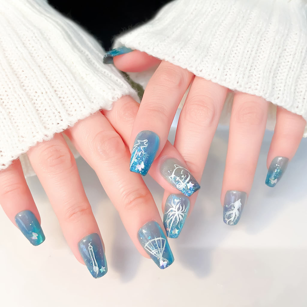 medium length teal coffin press on nails with game inspired designs