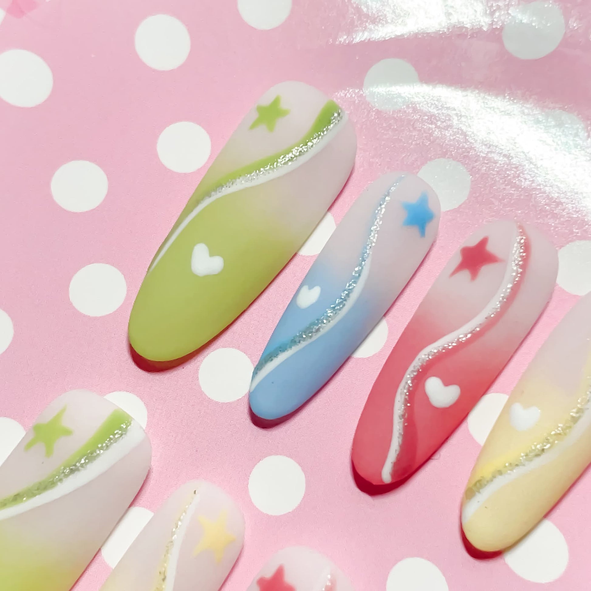 long length multicolour oval press on nails with macaron colours