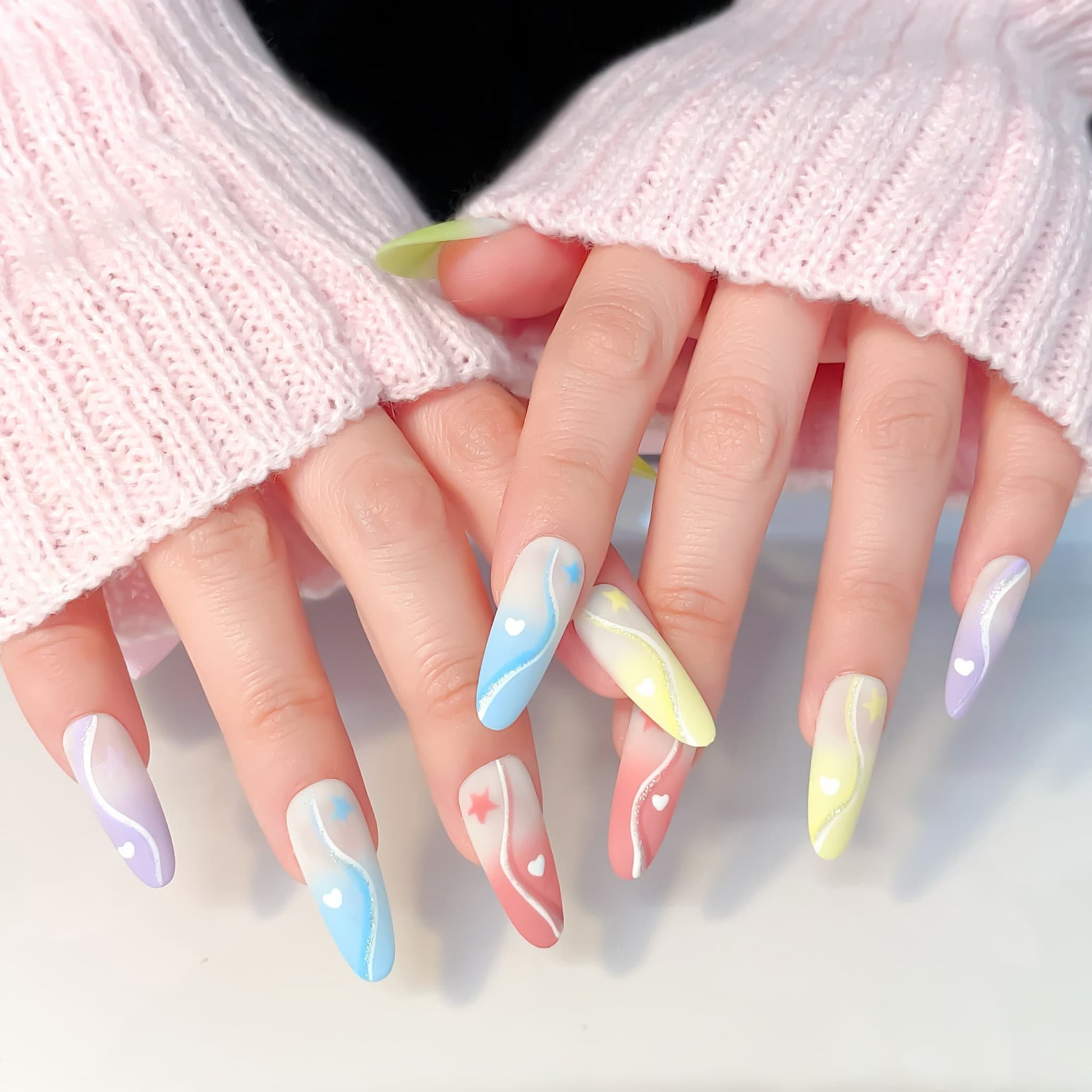 long length multicolour oval press on nails with macaron colours