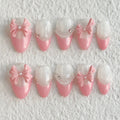 short light pink almond press on nails with bow design