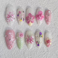 medium length pink almond press on nails with 3d flower design