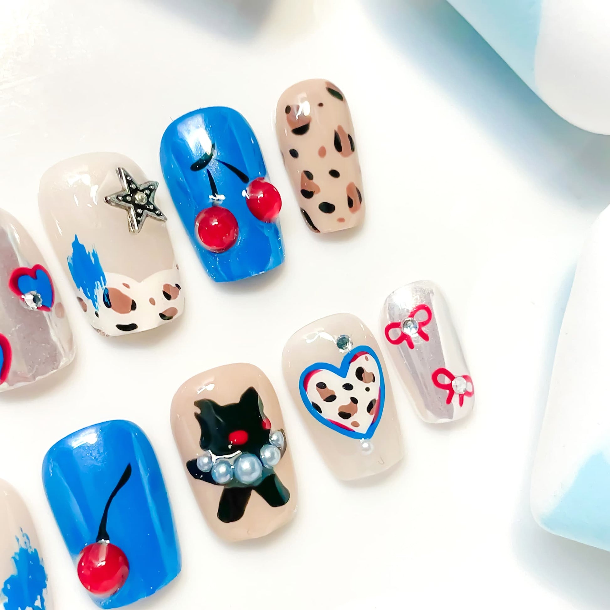 short length blue coffin press on nails with leopard design
