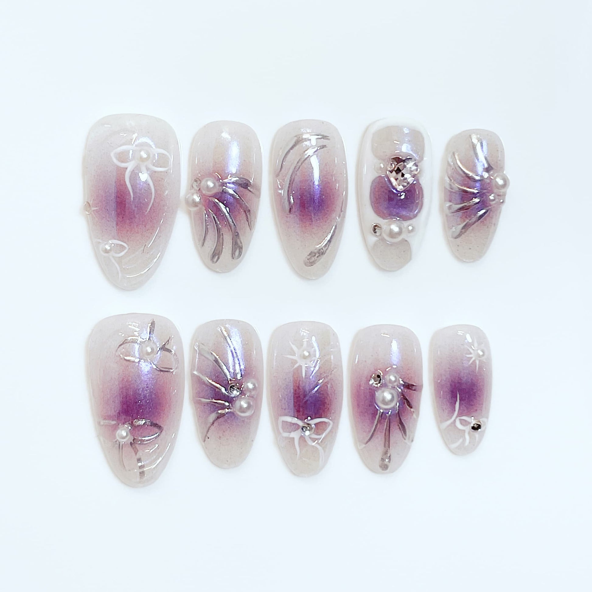 medium length purple almond press on nails with bow and pearl design