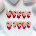 medium length dark red almond press on nails with french tips cherry design