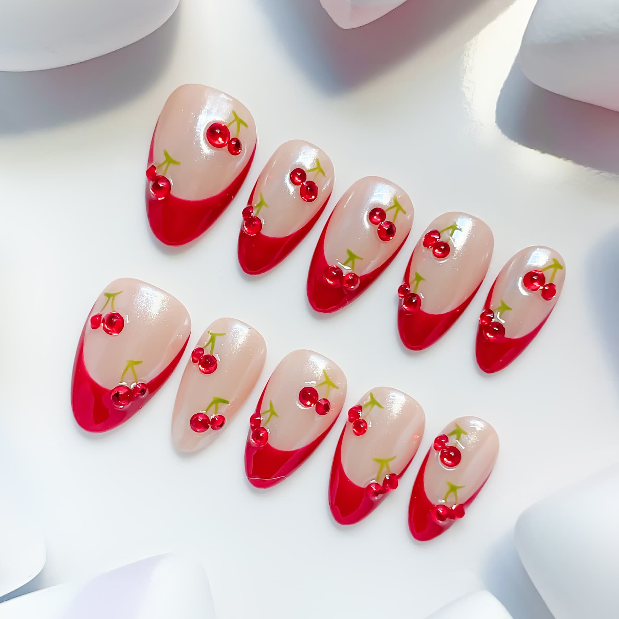 medium length dark red almond press on nails with french tips cherry design