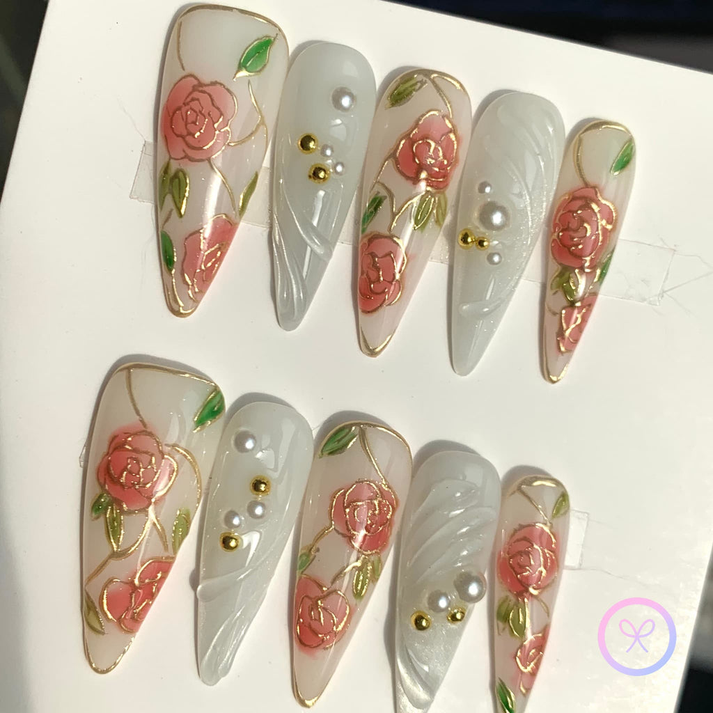 elegant white glossy long stiletto press on nails with gilded roses and swirls