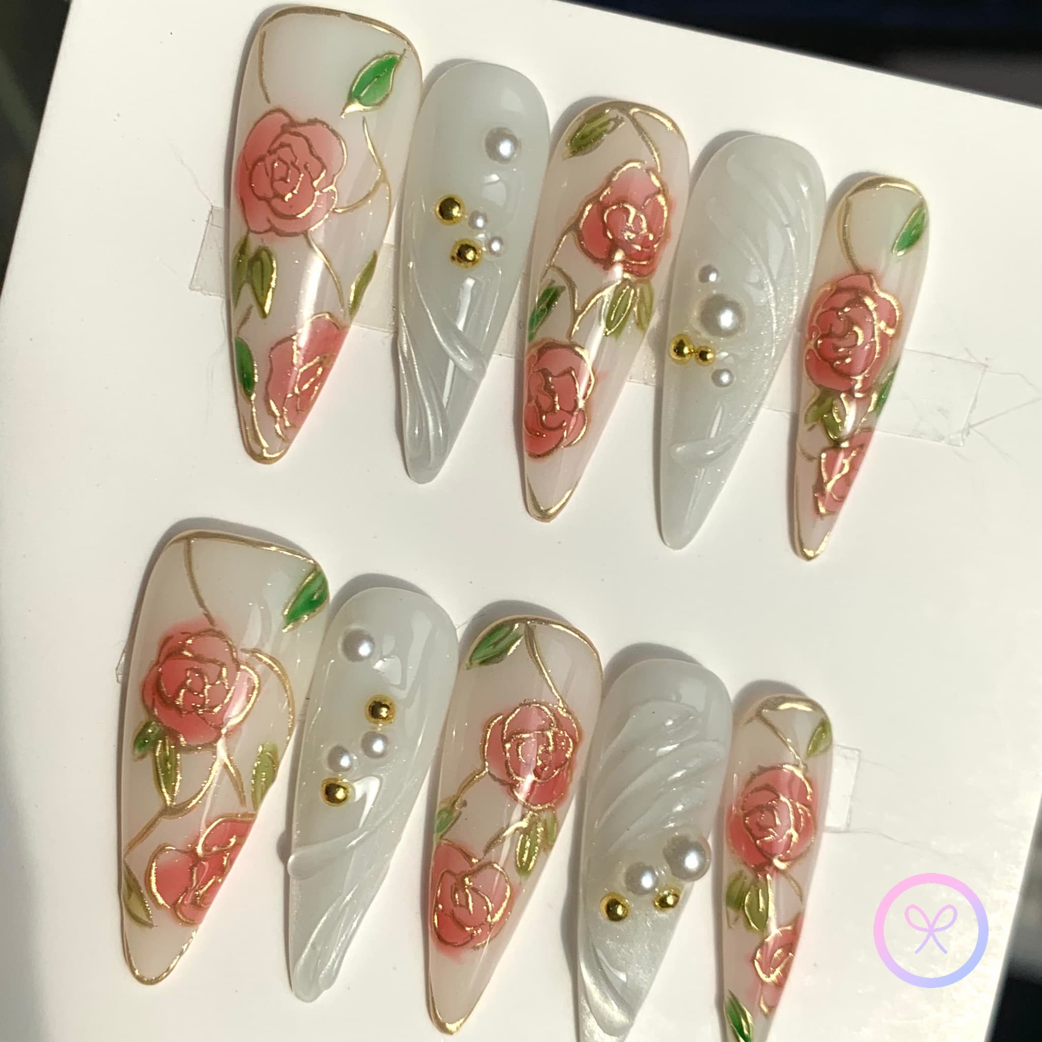 elegant white glossy long stiletto press on nails with gilded roses and swirls