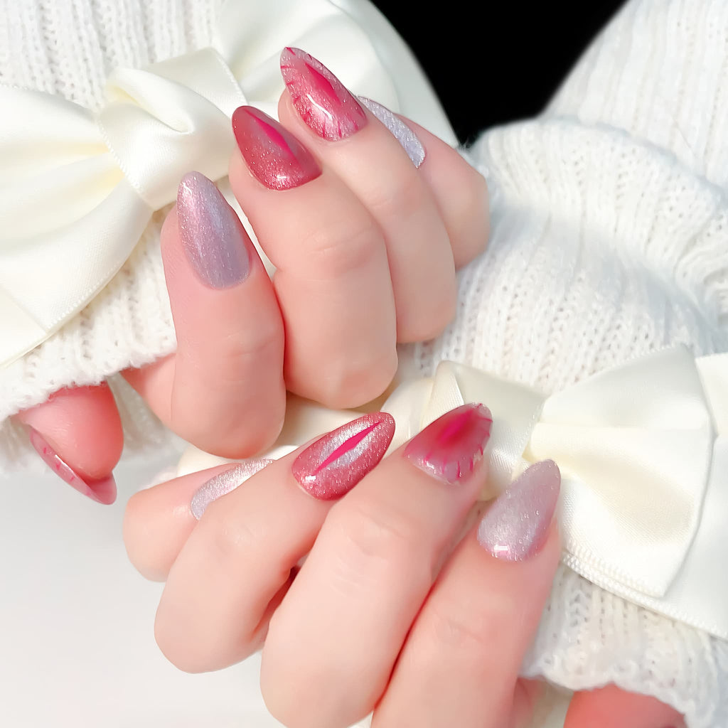 short length red almond press on nails with cat eye design