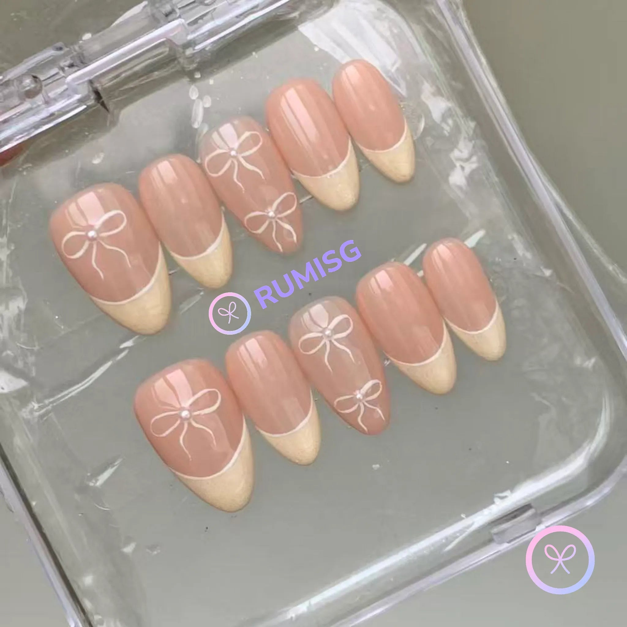 minimalist nude glossy short almond press on nails with mini bow and french tip