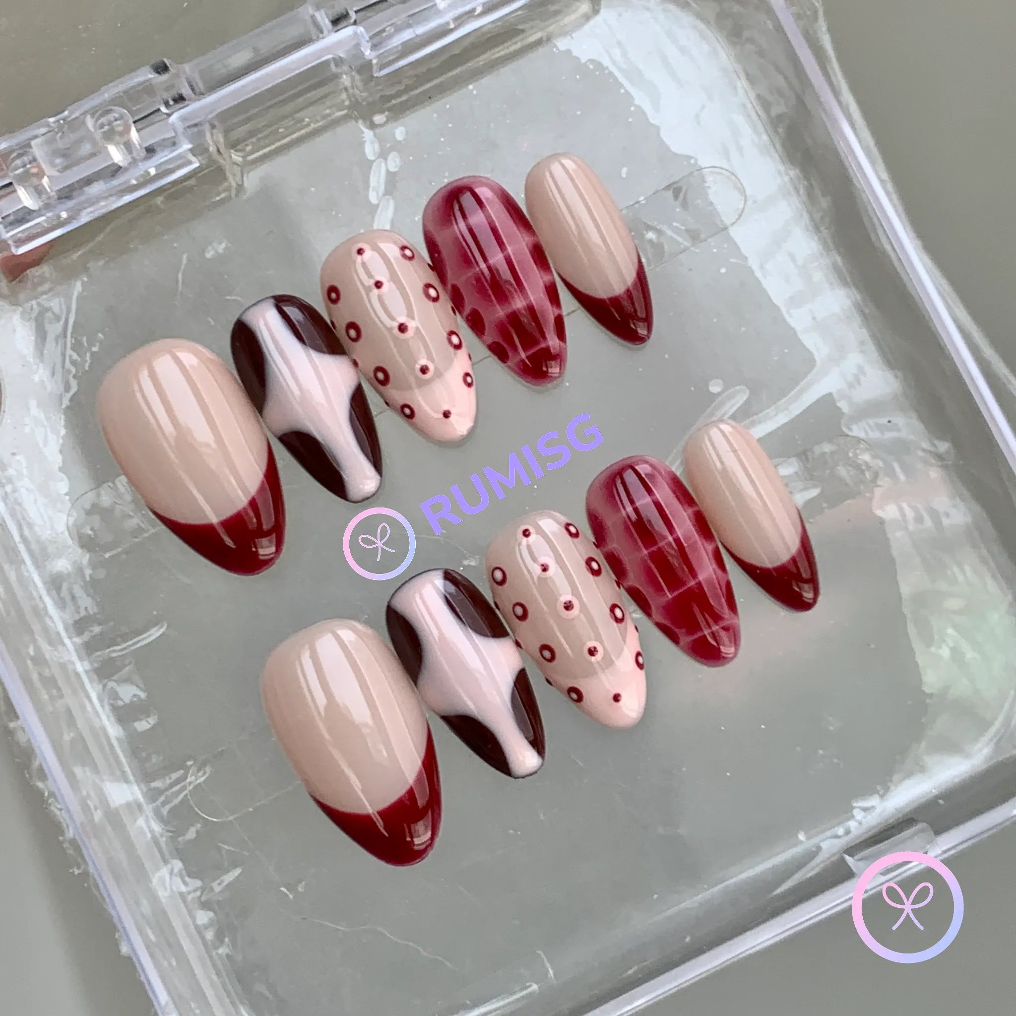 elegant red glossy short almond press on nails with bloom scales and circles