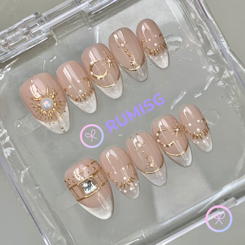 elegant nude glossy short almond press on nails with filigree and glitter