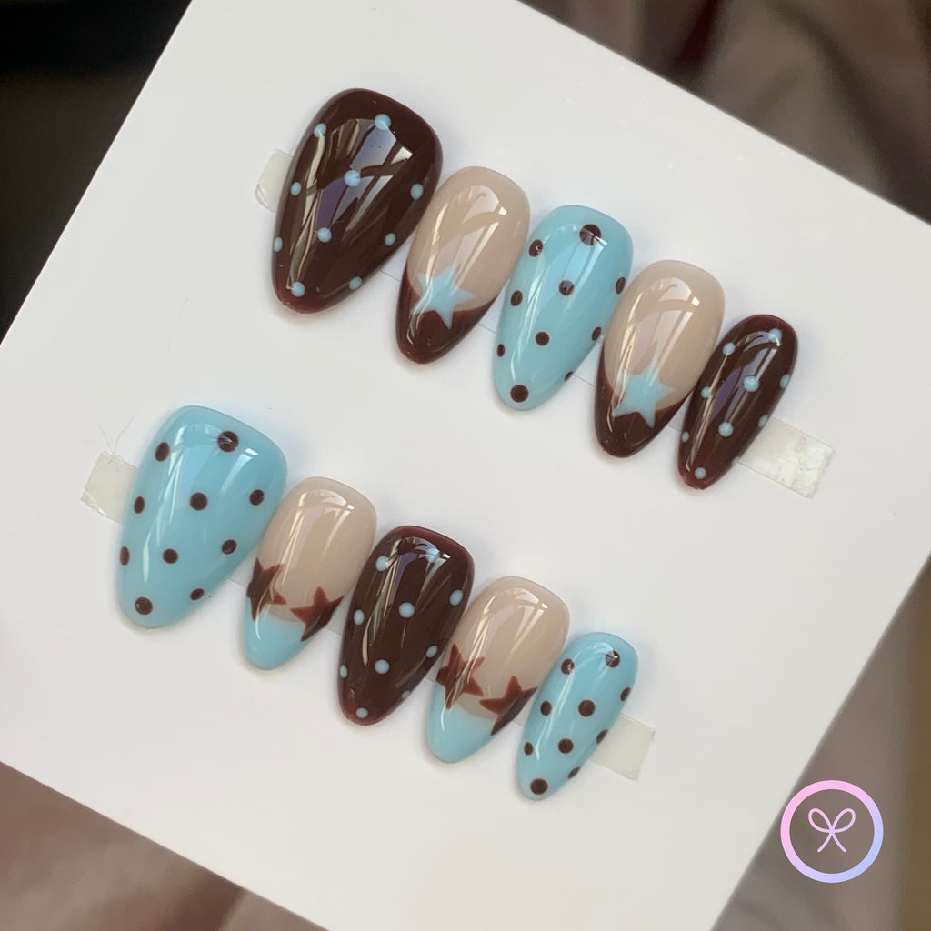 cute brown glossy short almond press on nails with polka dots and stars