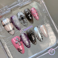 goth black glossy medium almond press on nails with cross charm and filigree