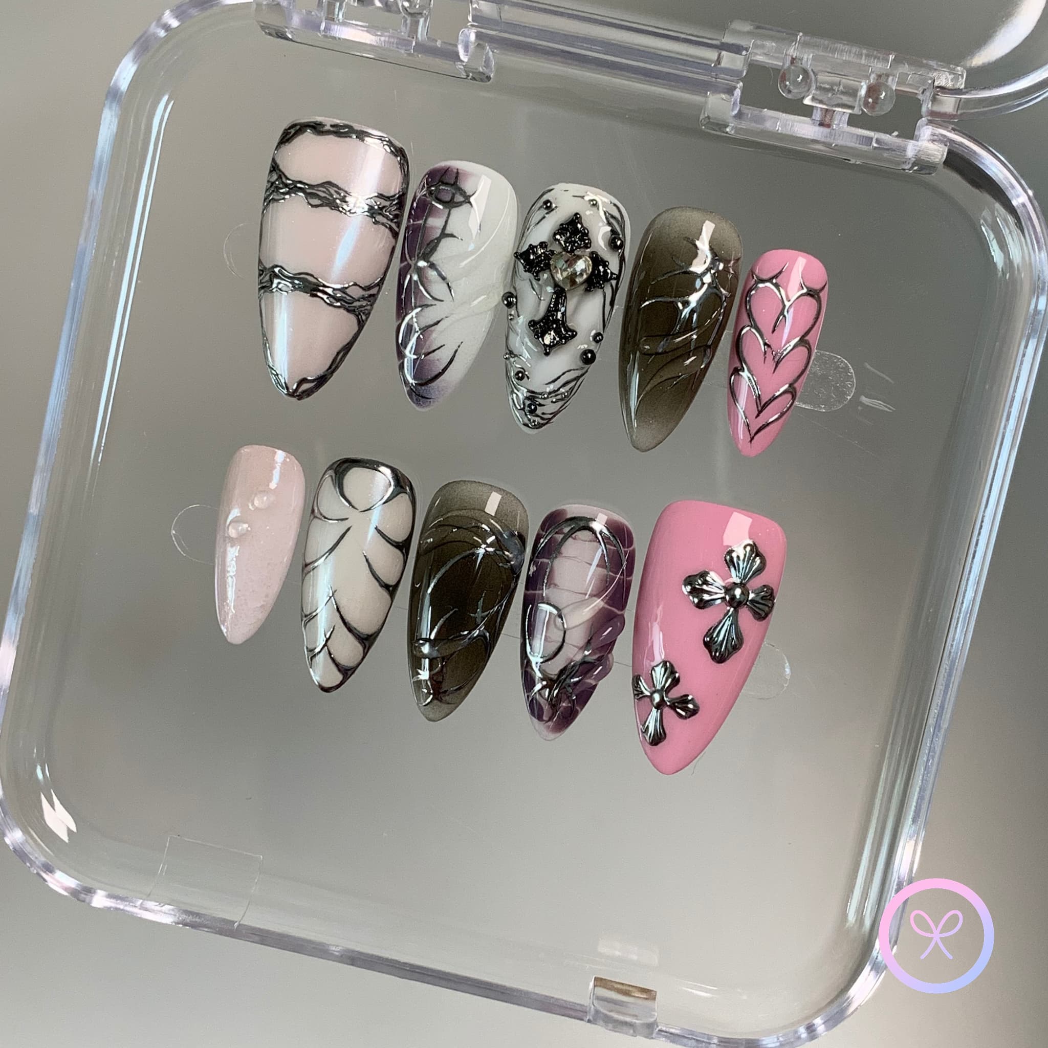 gothic black glossy medium almond press on nails with cross charms and chrome hearts